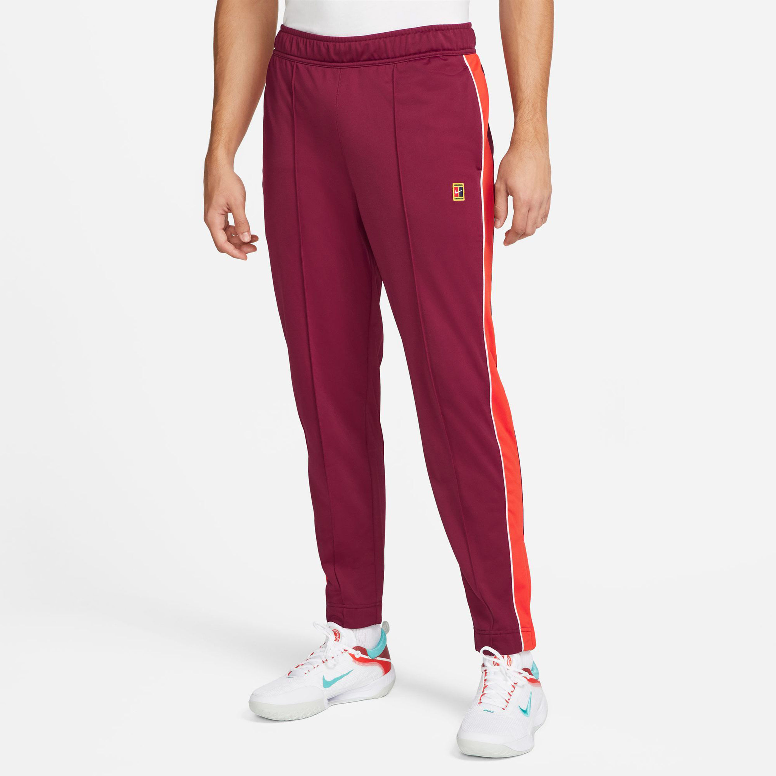 Nike heritage hotsell red track pants